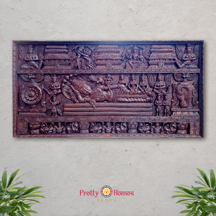 Hand-carved wooden panel depicting figures of deities from Hindu mythology, including Garuda, Lord Shiva, and Goddess Parvati, with intricate detailing.