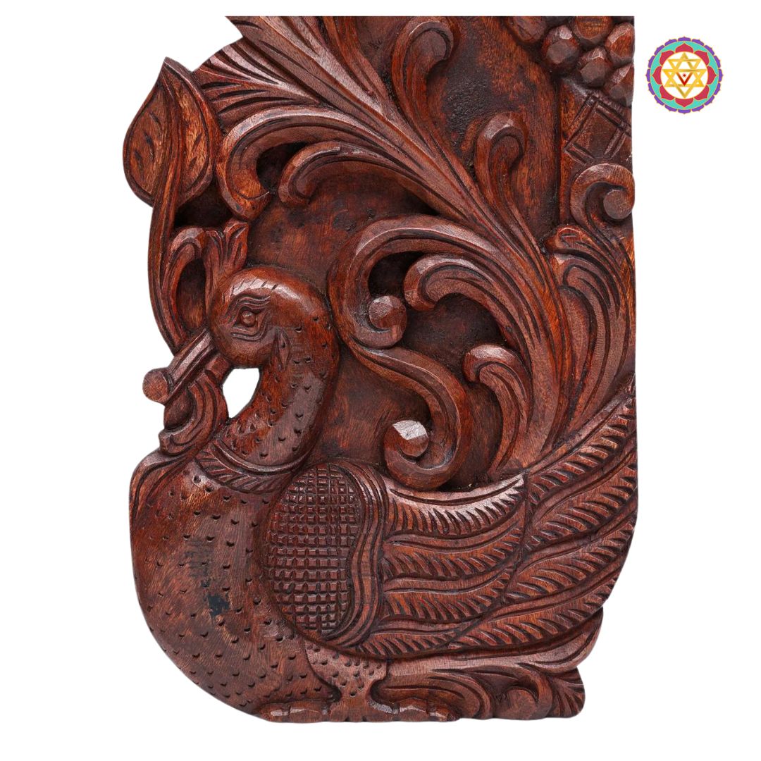 Close-up of hand-carved lotus and bird design