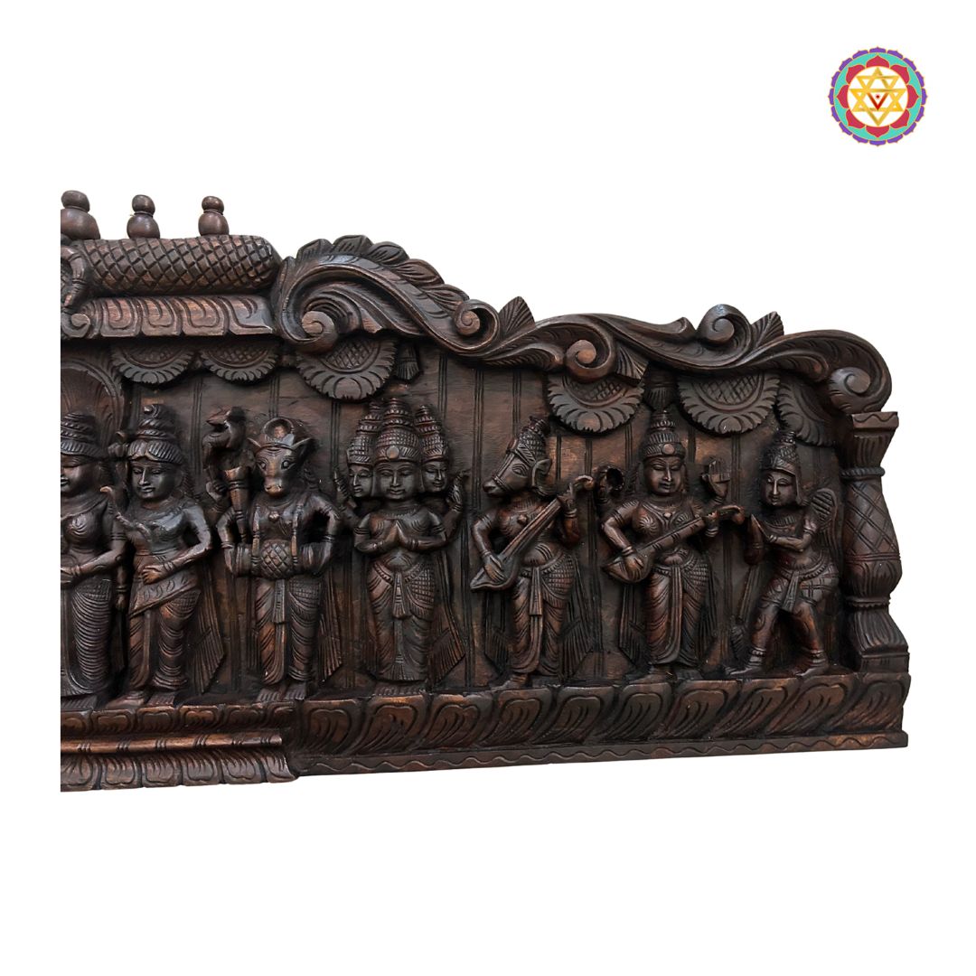 Side view of carved wedding panel in Vagai wood