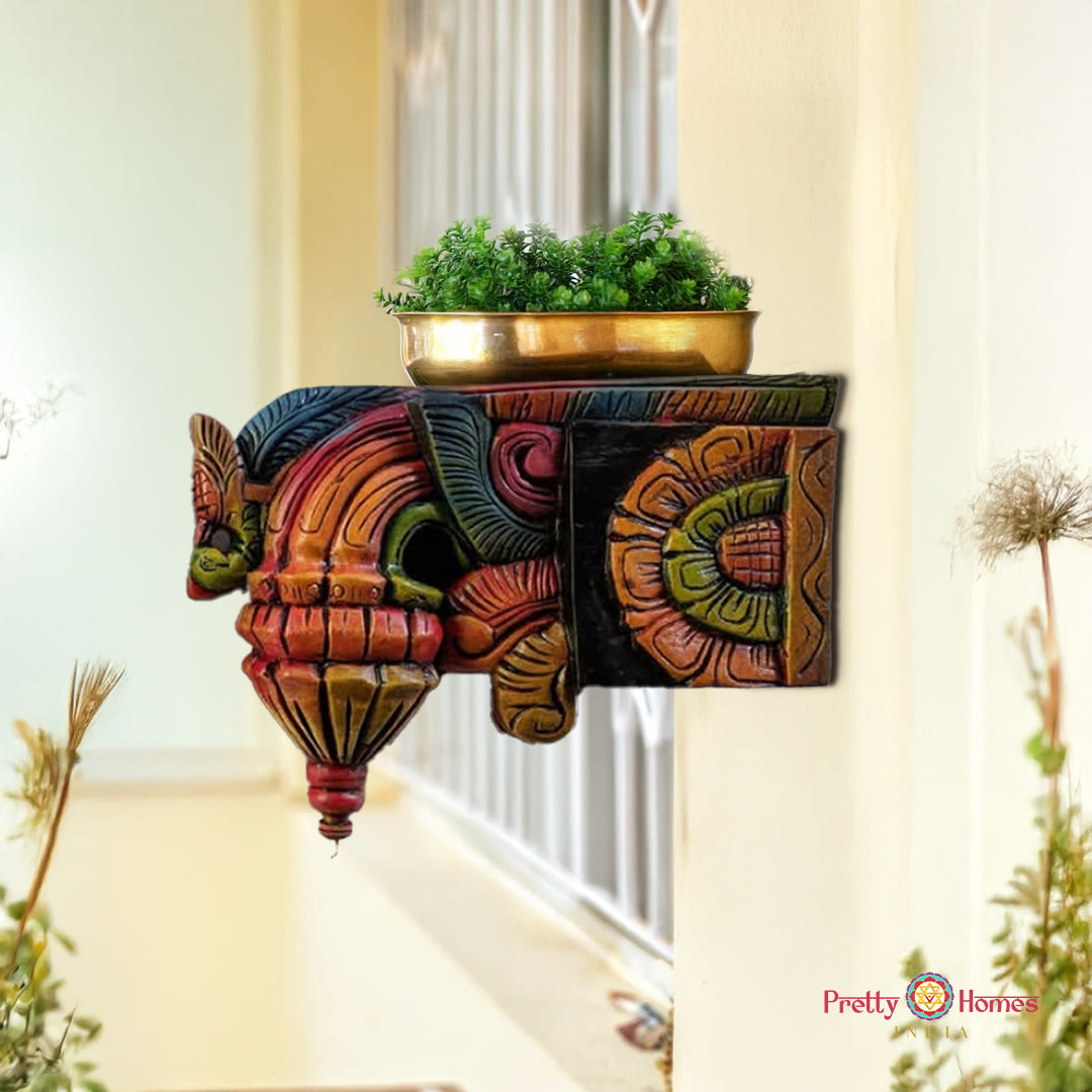 “Handcarved carved wooden wall bracket with Bodhi leaf and bird motif”