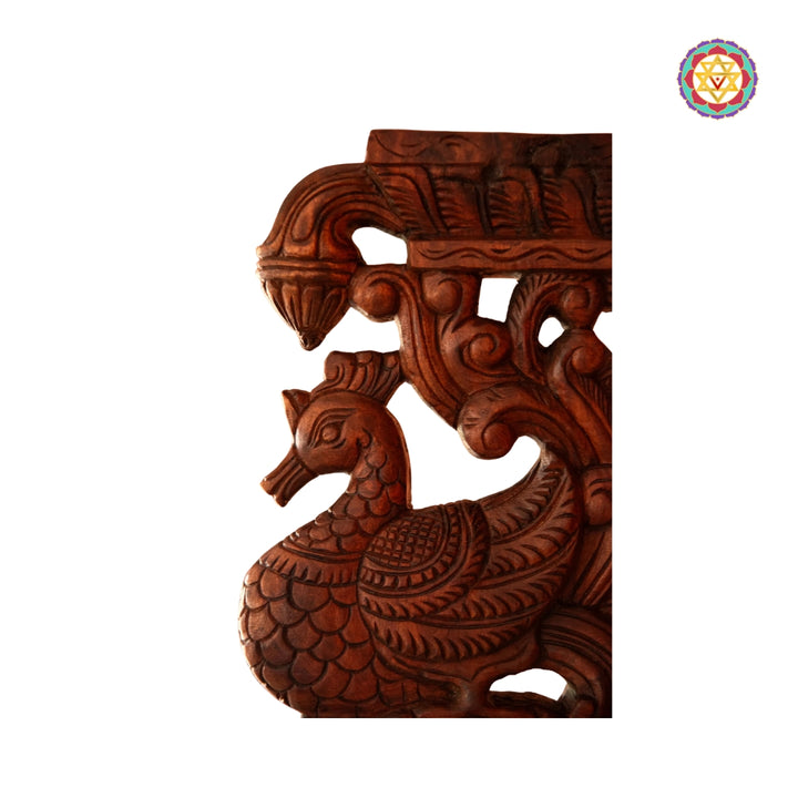 Side view of Annapakshi carving with floral elements