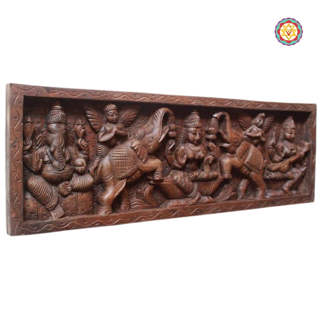 Detailed carving of Saraswati with veena in wood wall art