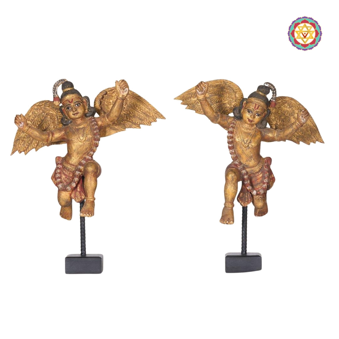 close-up of hand-carved details on indian angel wooden statue