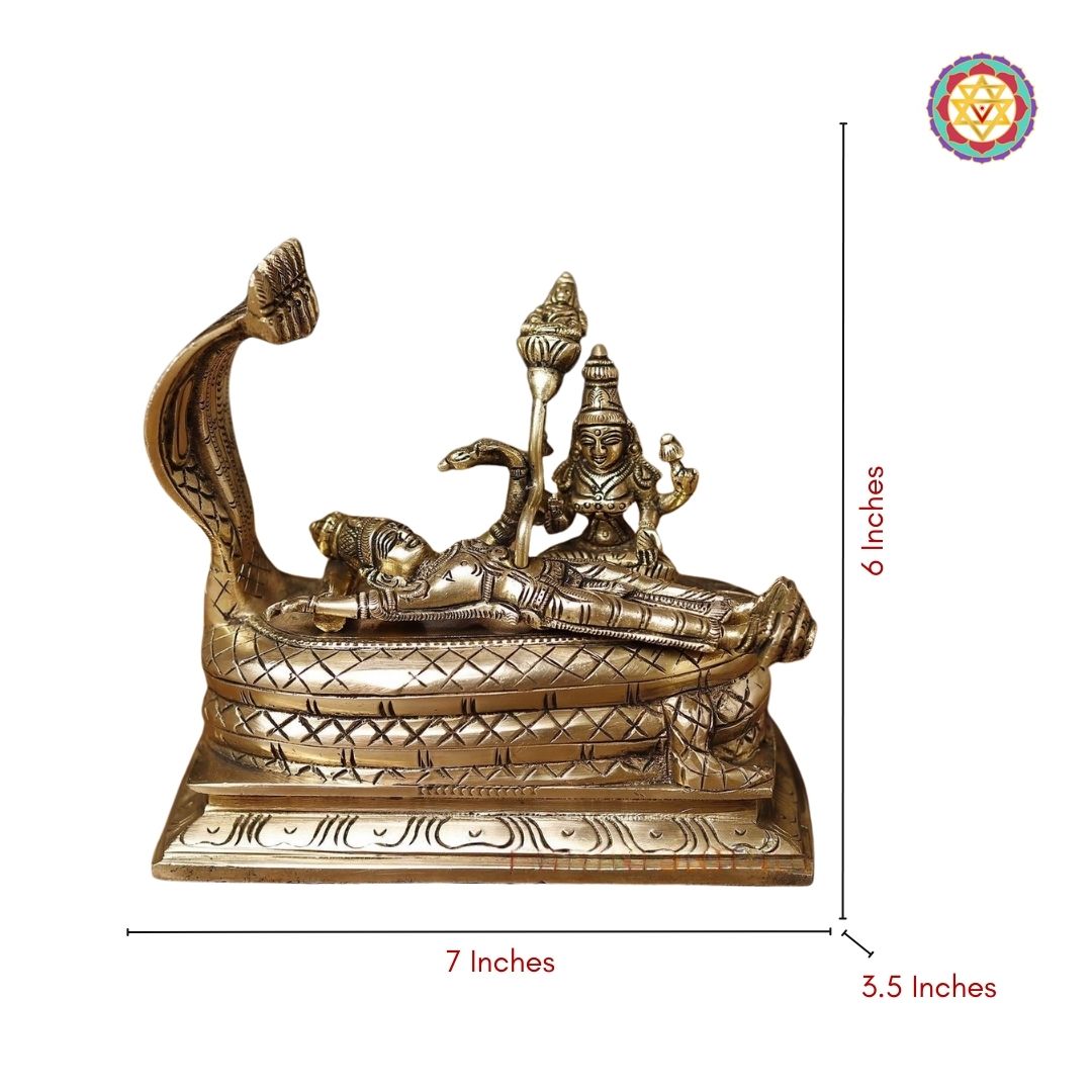 profile view of brass Vishnu Lakshmi idol with traditional styling