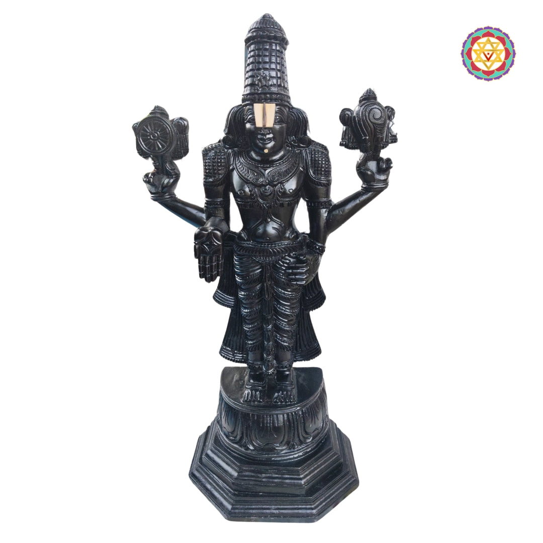 front view of teak perumal balaji idol highlighting carved crown and robes