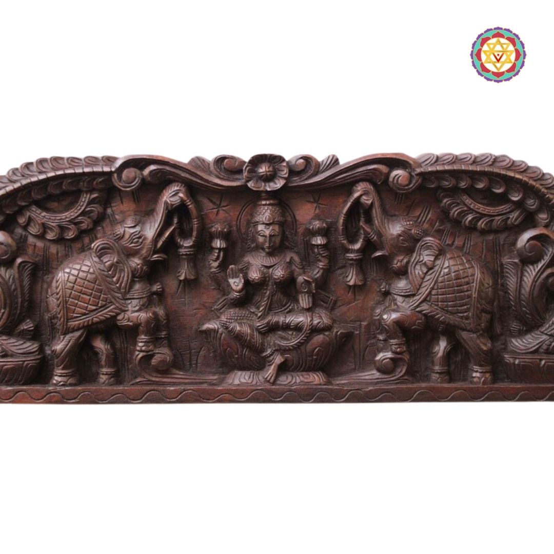 gajalakshmi panel close up showing goddess lakshmi and carved peacocks