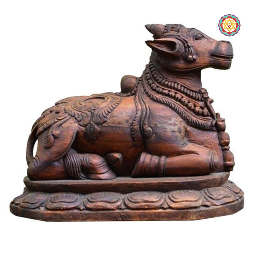 Antique-finish wooden Nandi bull statue symbolizing devotion to Shiva