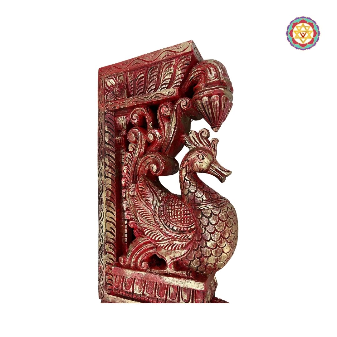 Side view of paired hamsa bird wooden brackets mounted on wall