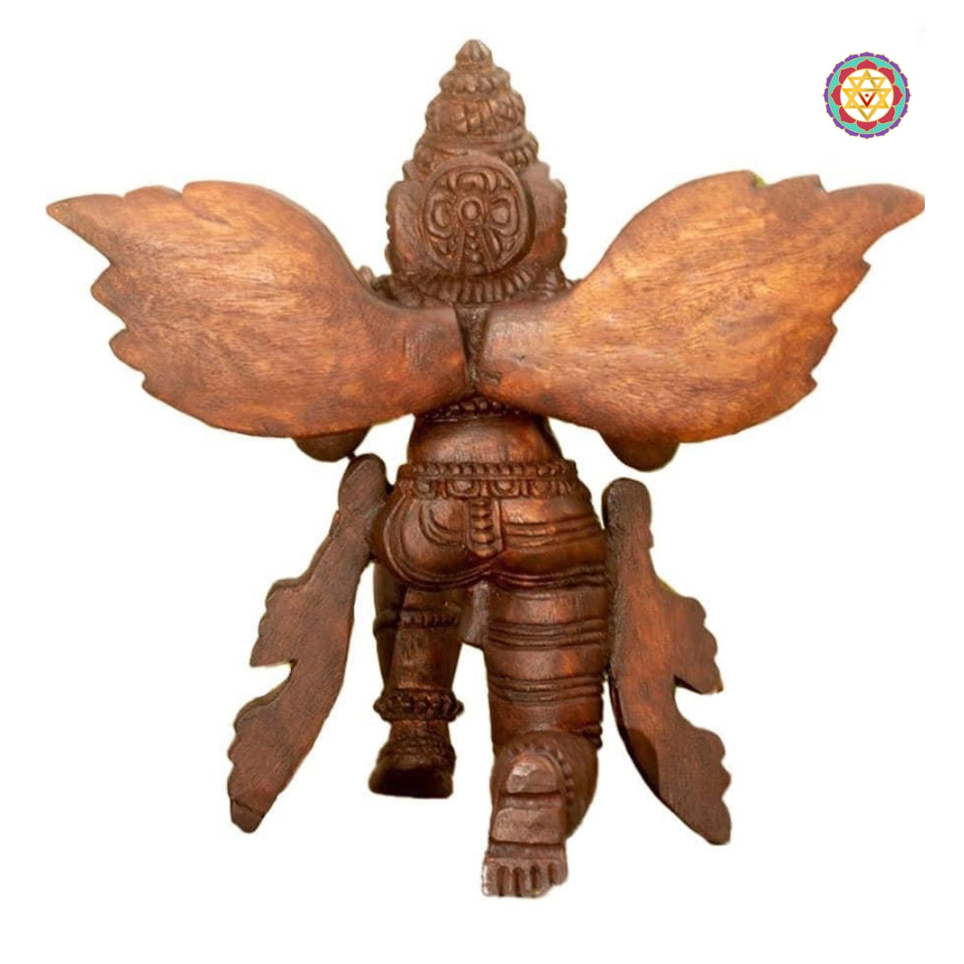 Rear view of Garuda sculpture highlighting carved wings and body contours — detailed handcraft for spiritual home decor