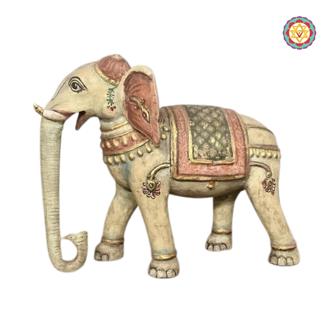 Side profile of vintage Airavat elephant sculpture with decorative pattern