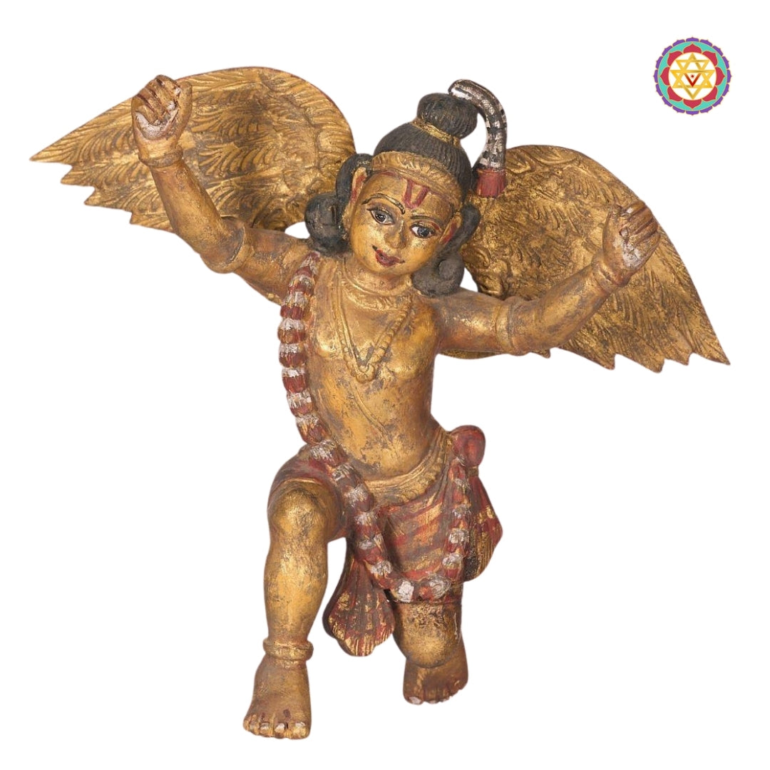 side view of carved gandharva sculpture with ornate wings
