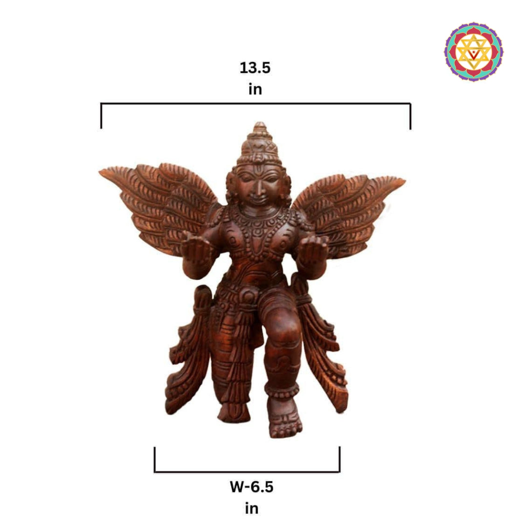 Angled view of wooden Garuda statue on pedestal — antique gold brown finish, artisan craftsmanship for mandir or living space