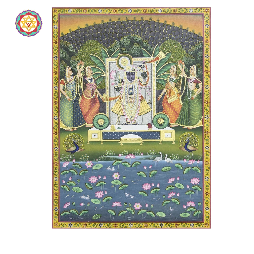 Traditional Pichwai scene showing Shrinathji adorned with jewelry and lotus flowers