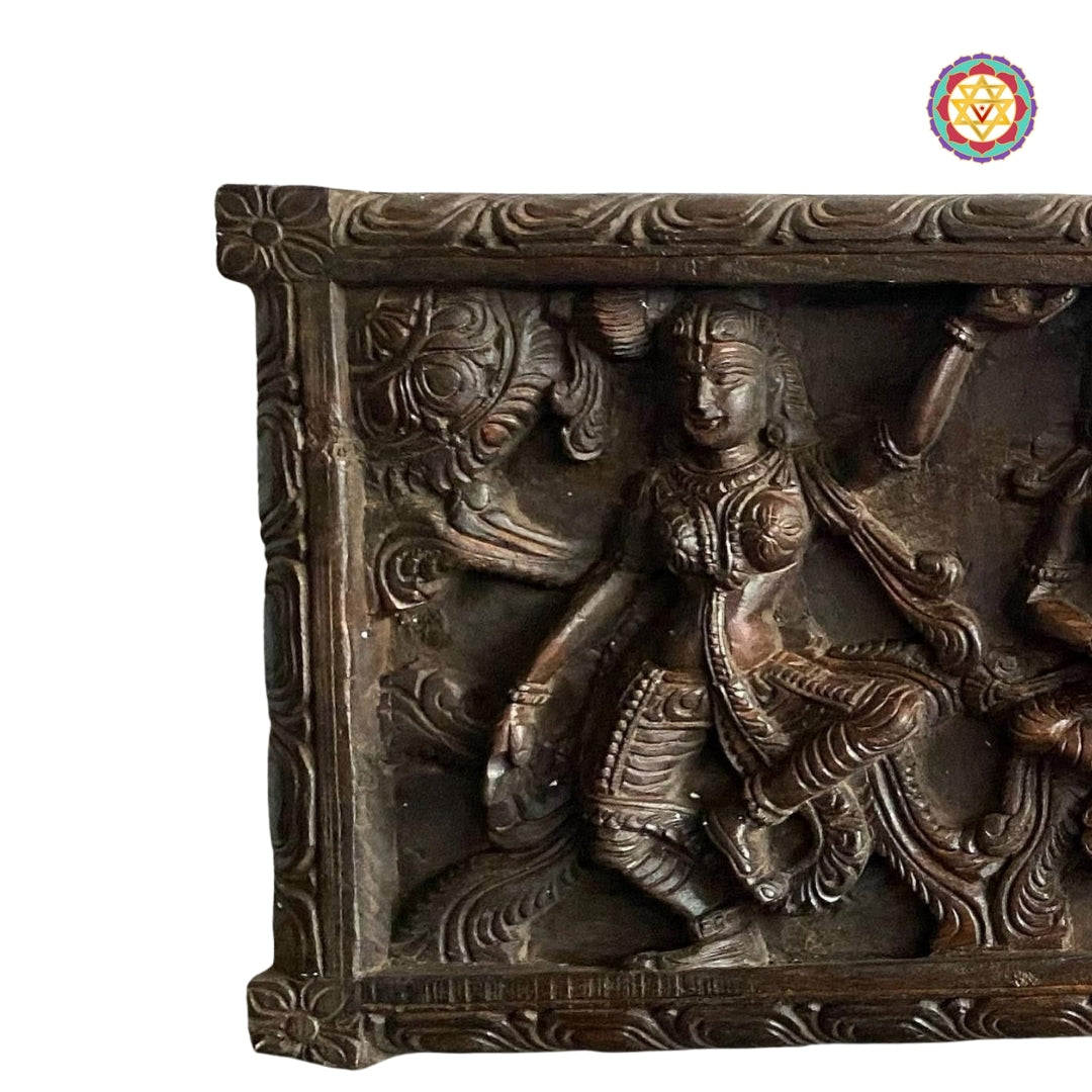 Side angle of antique wooden Apsara wall panel