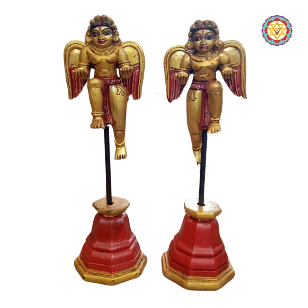 Woodcarved Gandharva sculpture mounted on wooden carved stand