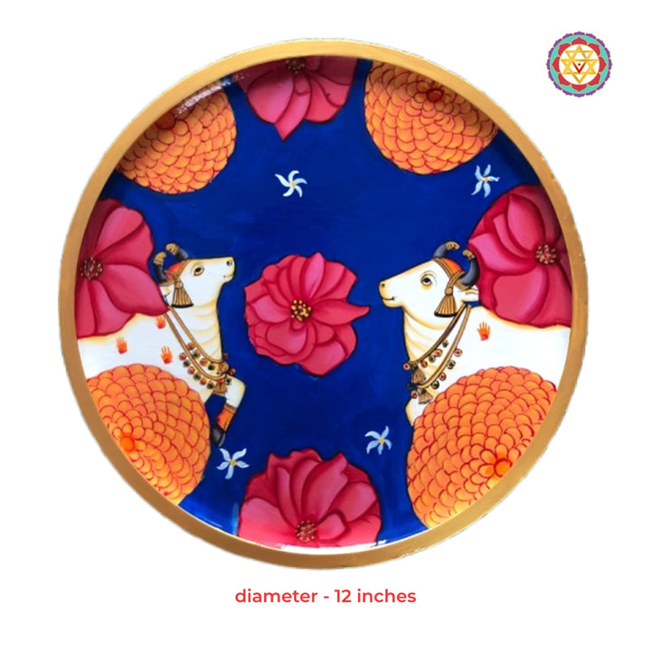 Floral adorned Pichwai cow decorative wall plate handcrafted traditional Indian heritage artwork
