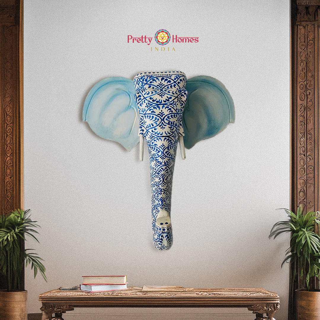 Hand-painted wooden elephant head wall hanging with antique detailing