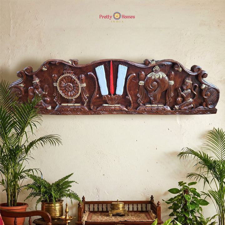 Thirty-six inch horizontal Shankh Chakra Namam wall panel with temple carvings
