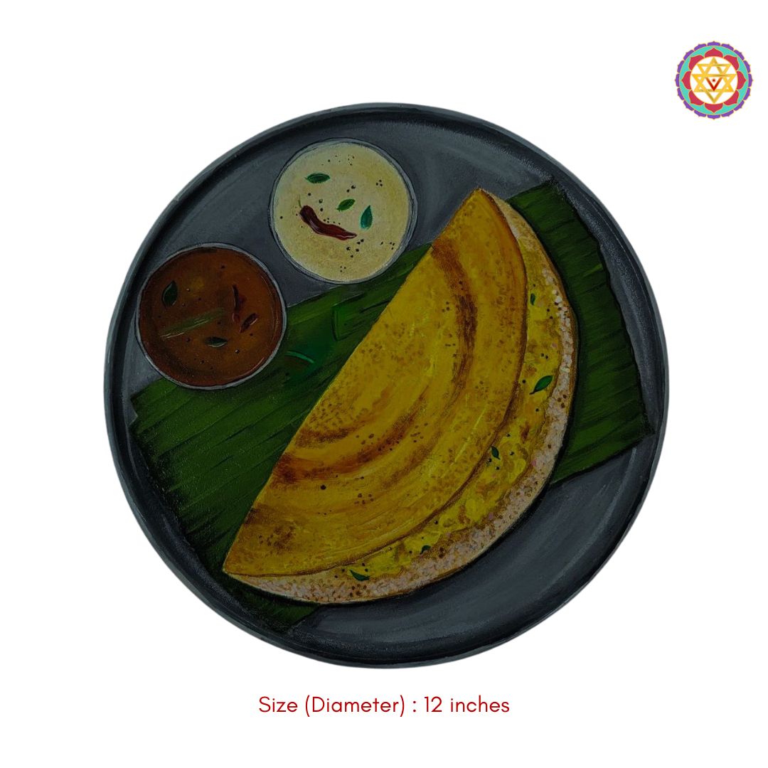close-up of dosa and chutney artwork on handcrafted plate