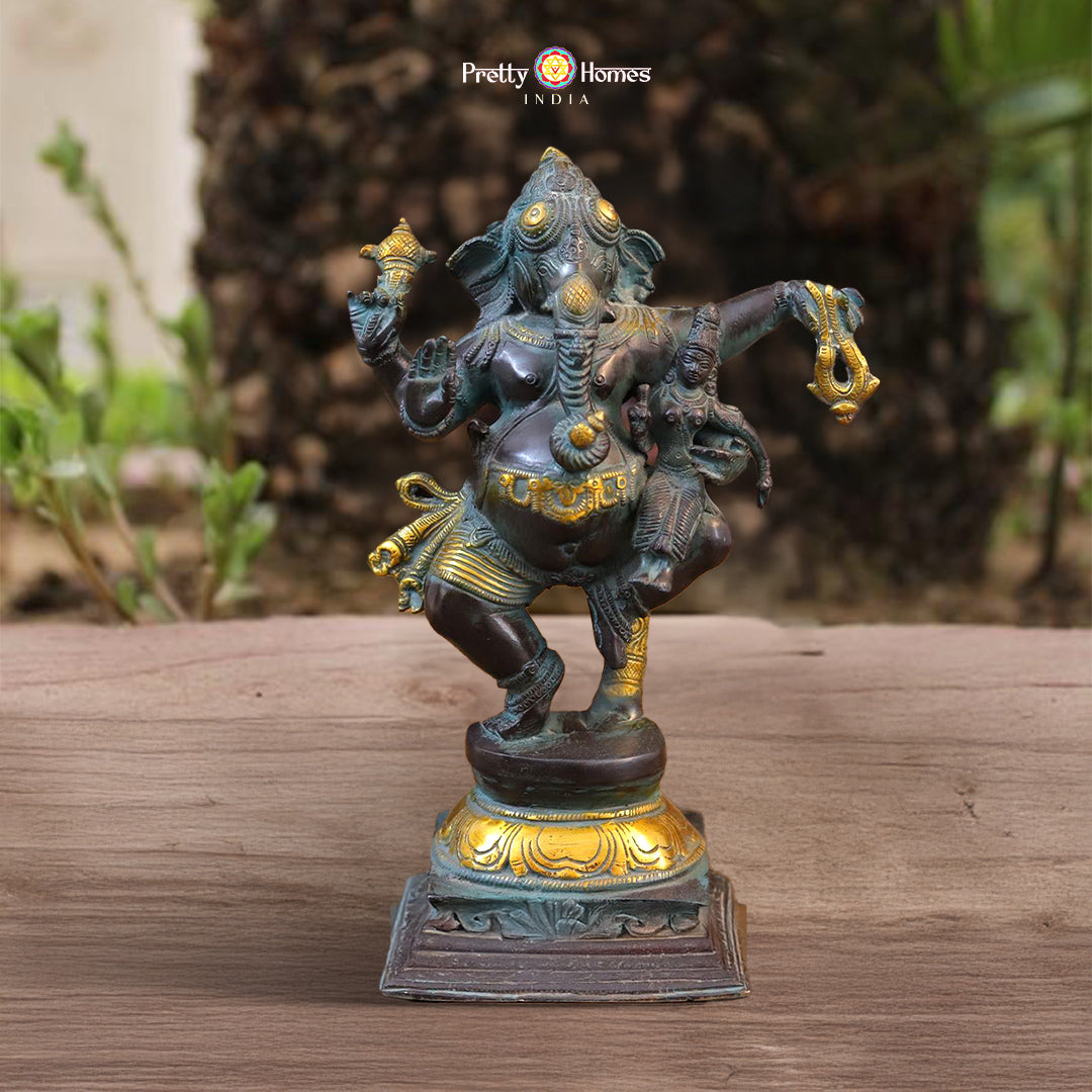 brass dancing Ganesh idol with vintage black patina and golden accents