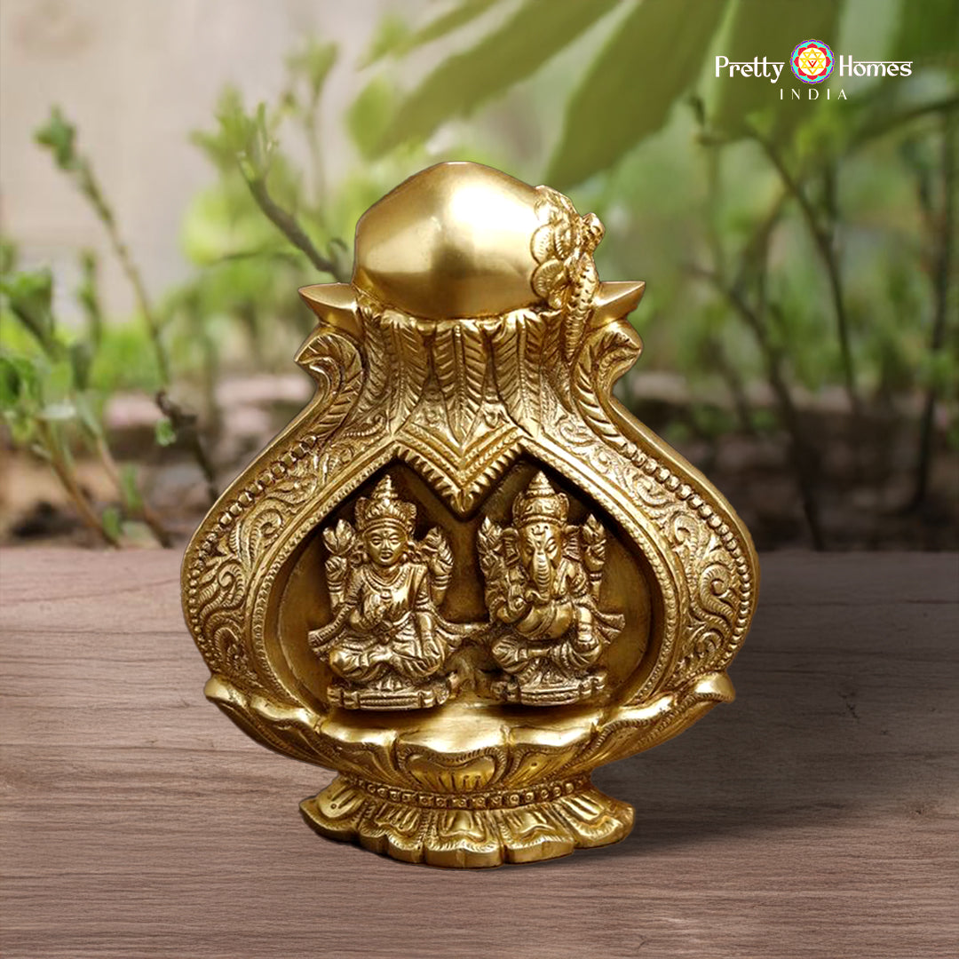 Brass kalash engraved with Lakshmi and Ganesha in fine golden polish on decorative base