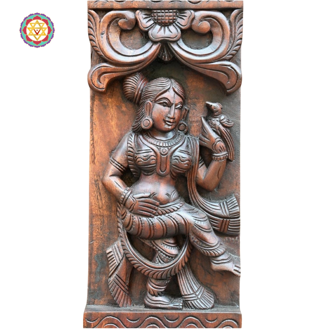 woodcarved vertical panel pair depicting musical apsaras in fine detail