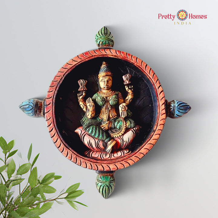 Wooden round wall plate featuring Goddess Lakshmi seated gracefully