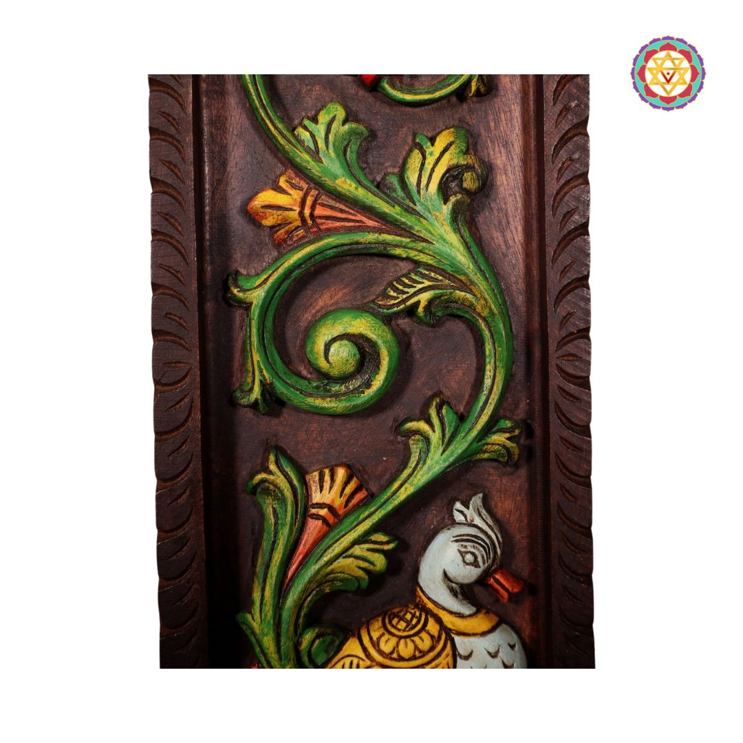 wood carved vertical annapakshi annam with lotus and vines side profile showing depth of relief
