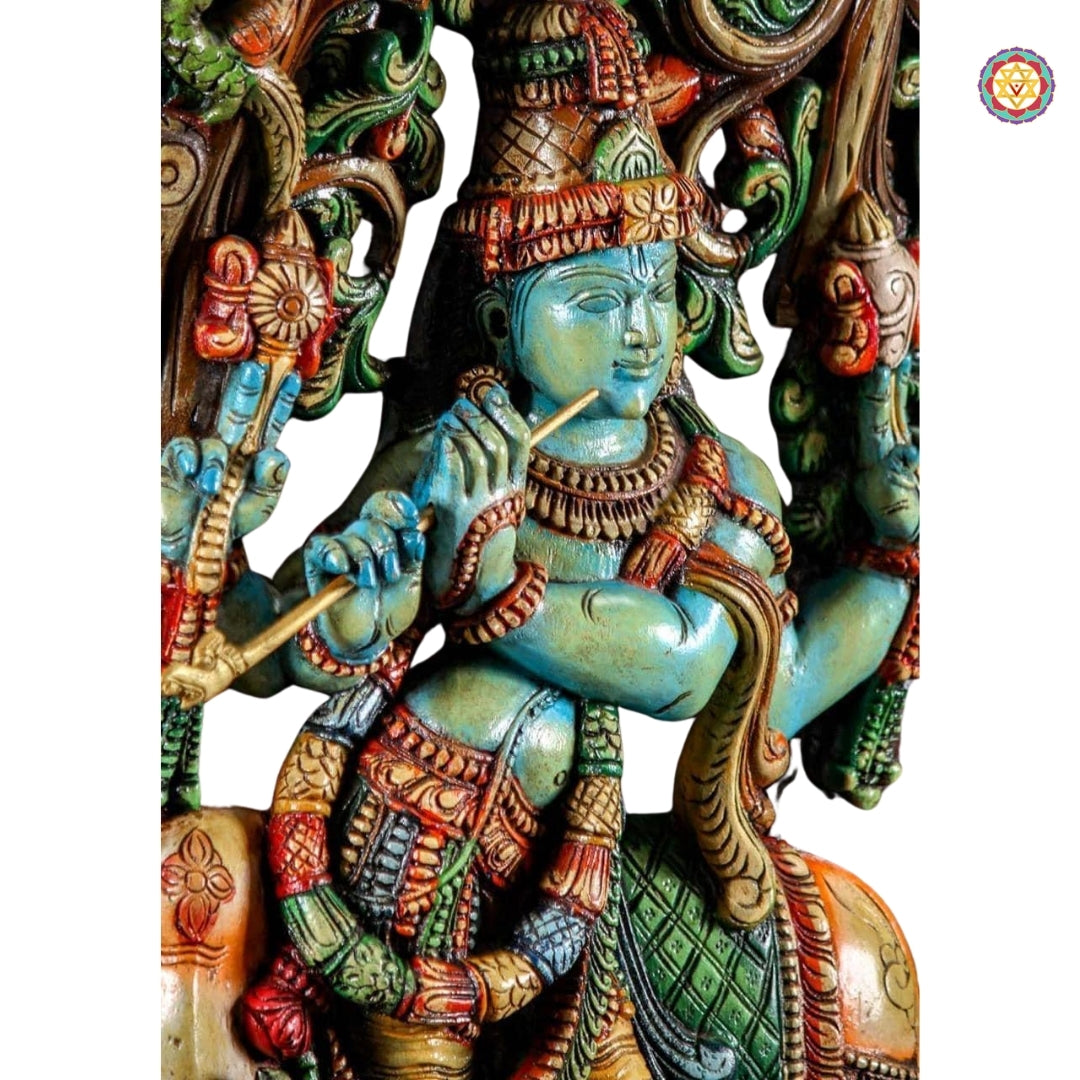 Full body Krishna carving in relaxed posture