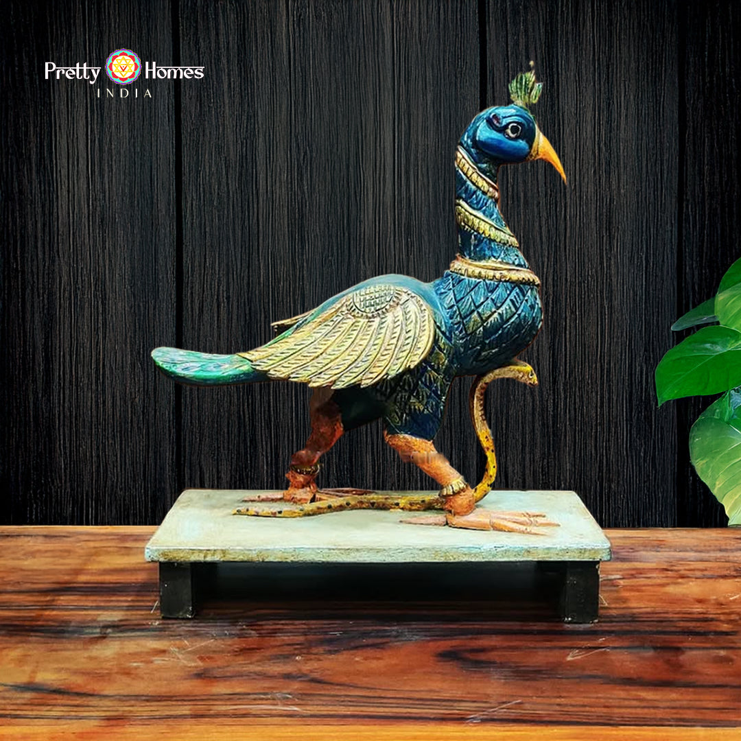 peacock sculpture base and detailing on wooden artwork