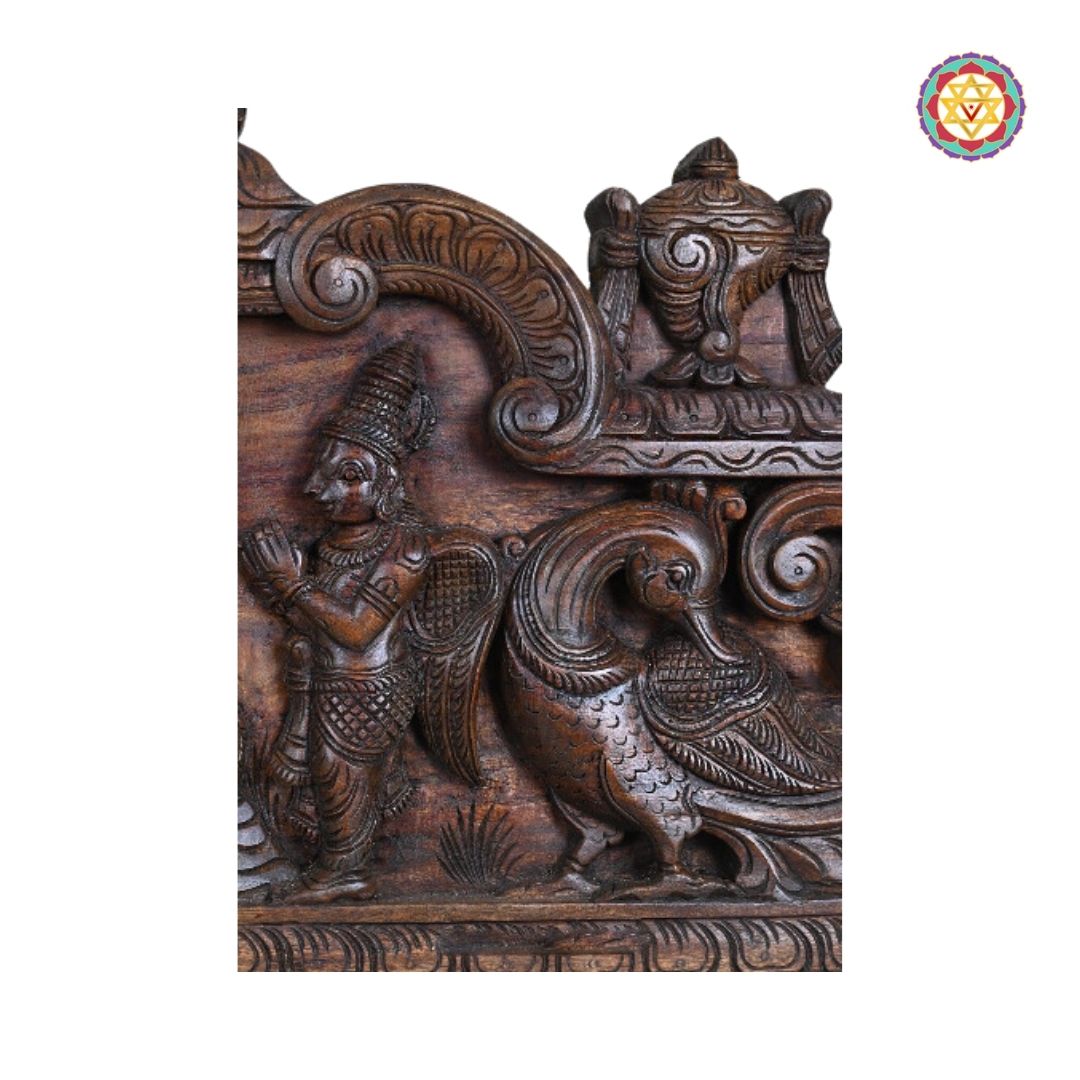 Center focus on Vishnu reclining on Adishesha with Lakshmi