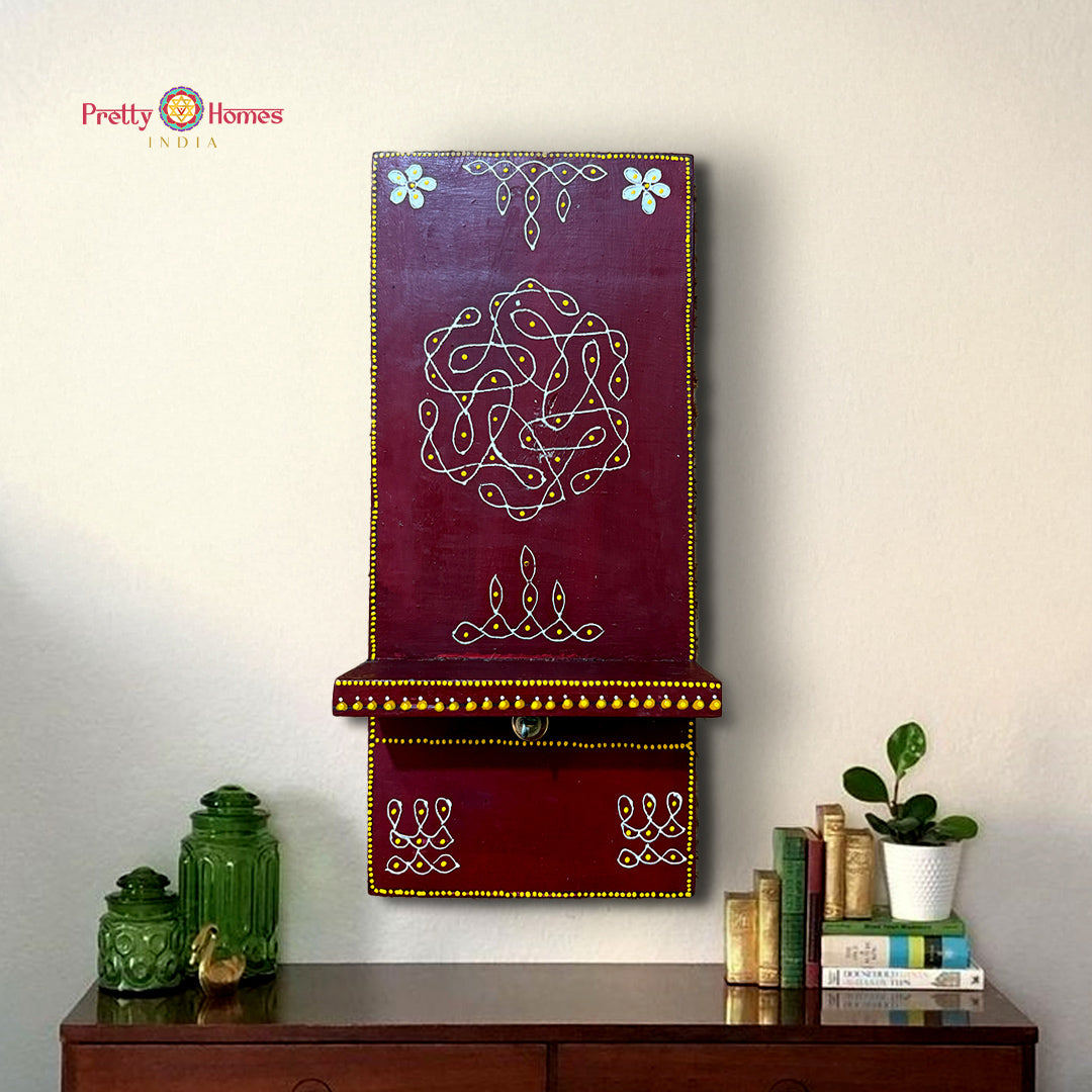 close-up of kolam pattern showing fine painted detailing