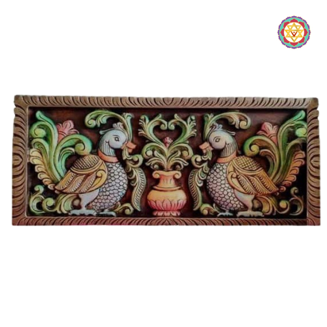 Colored carved wooden wall panel with Hamsa bird motif