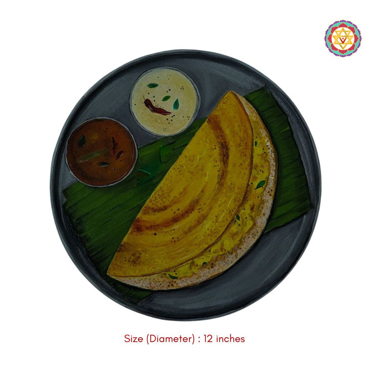 close-up of dosa and chutney artwork on handcrafted plate
