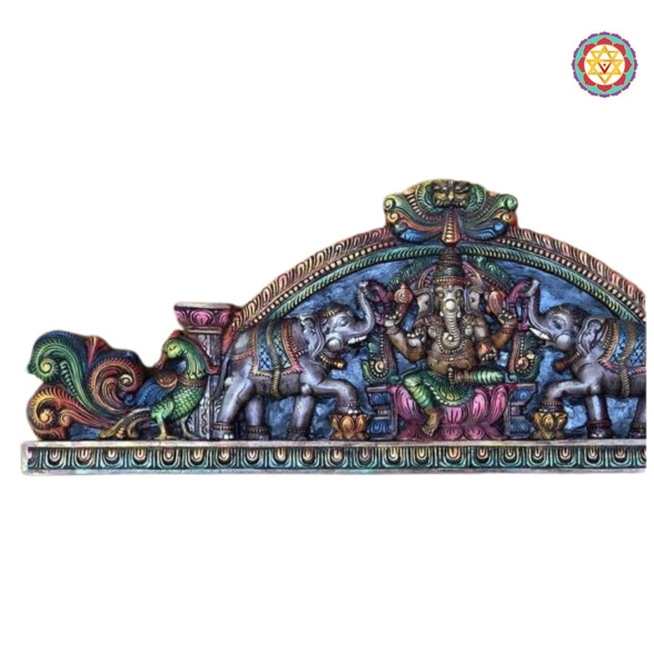 Decorative wall piece with intricate designs and colors on a white background. Front view of hand-painted Ganesha wall carving with birds.