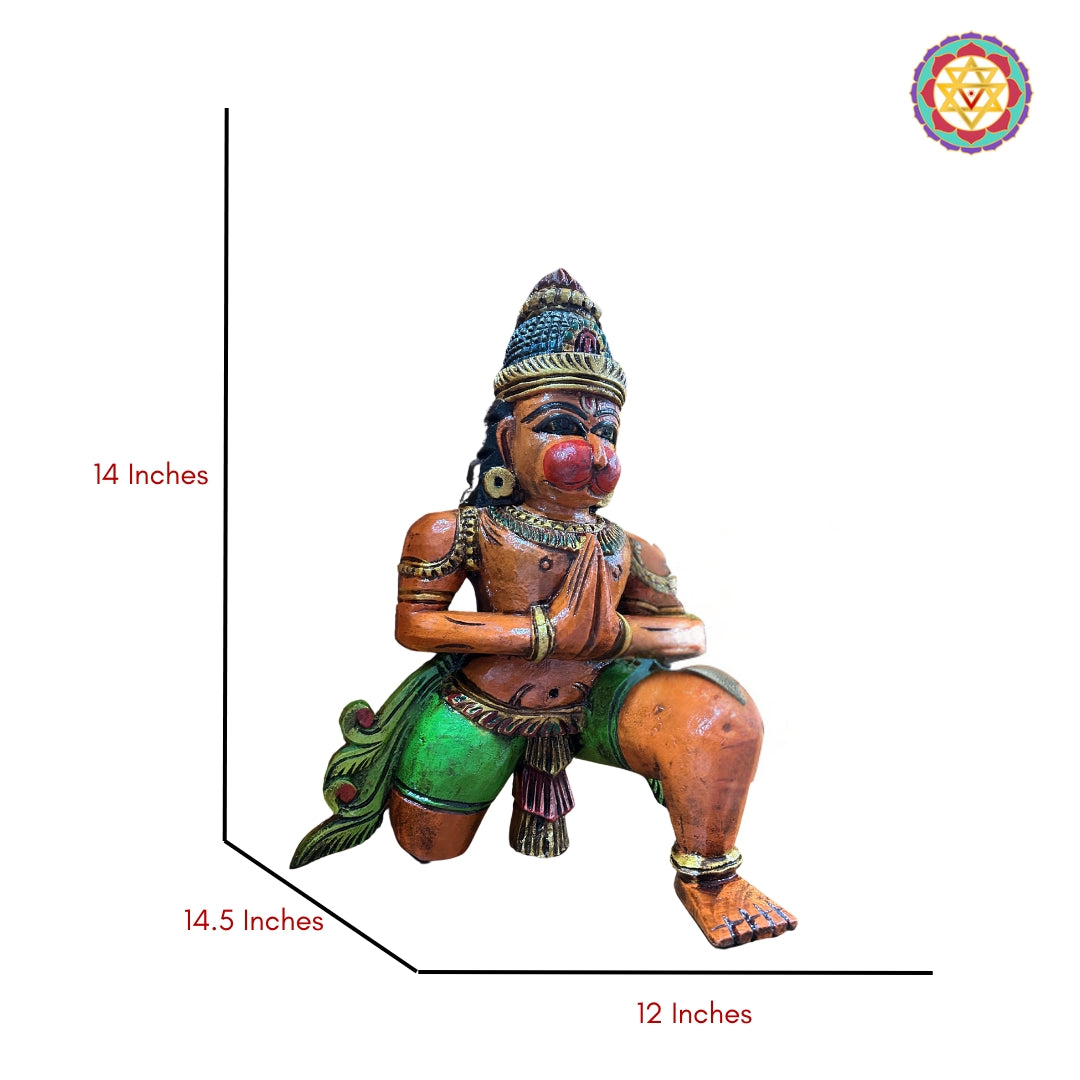 Detailed close-up of sitting Hanuman idol — carved facial features, mace, and base detailing, artisan Indian decor