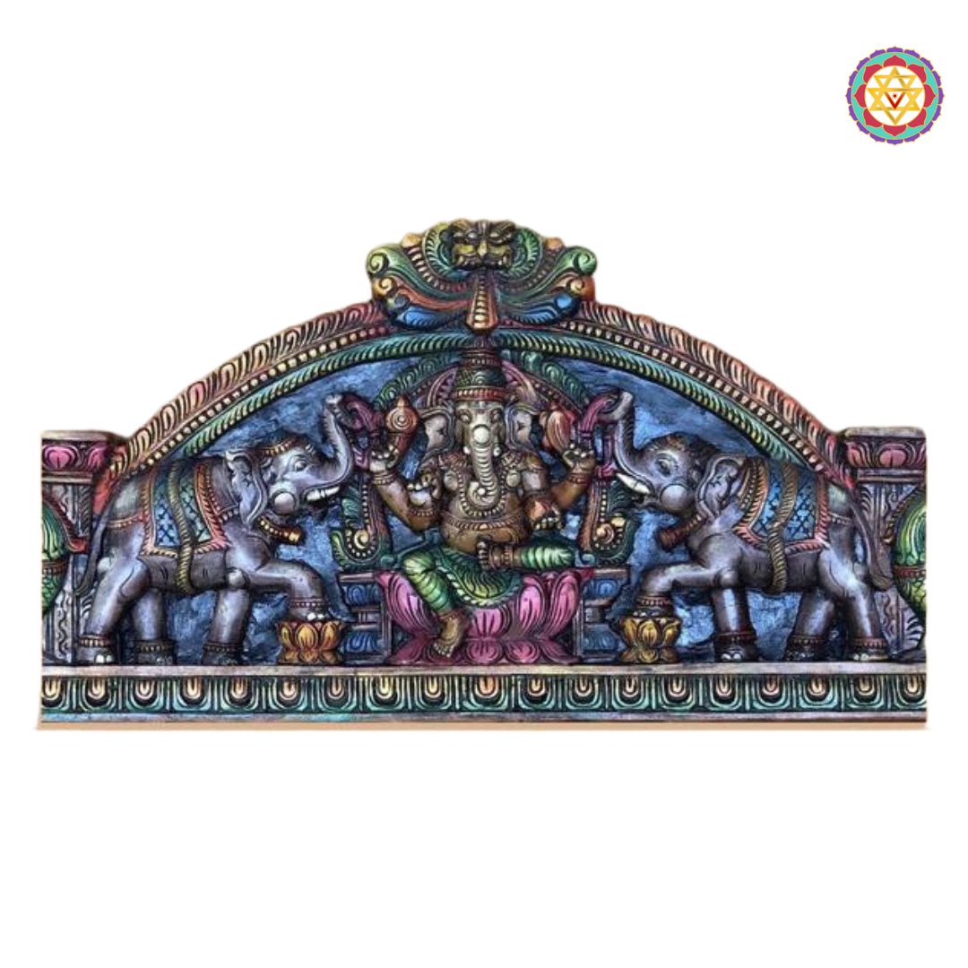 Decorative wall art with a colorful depiction of a deity and elephants on a white background. Angled top view of multicolour Ganesha wood panel

