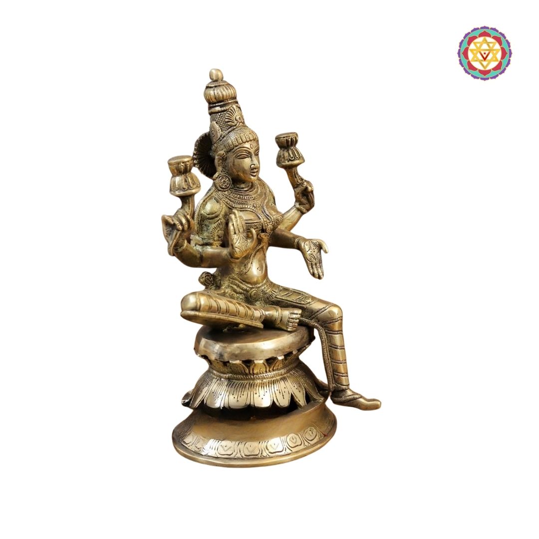 angled shot of Saraswati statue on decorative base