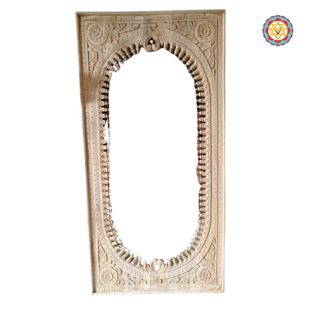 Oval mirror section within carved wooden frame