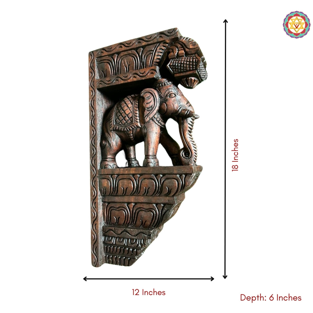 Full view of elephant wall bracket pair showing elegant carved details and symmetrical structure