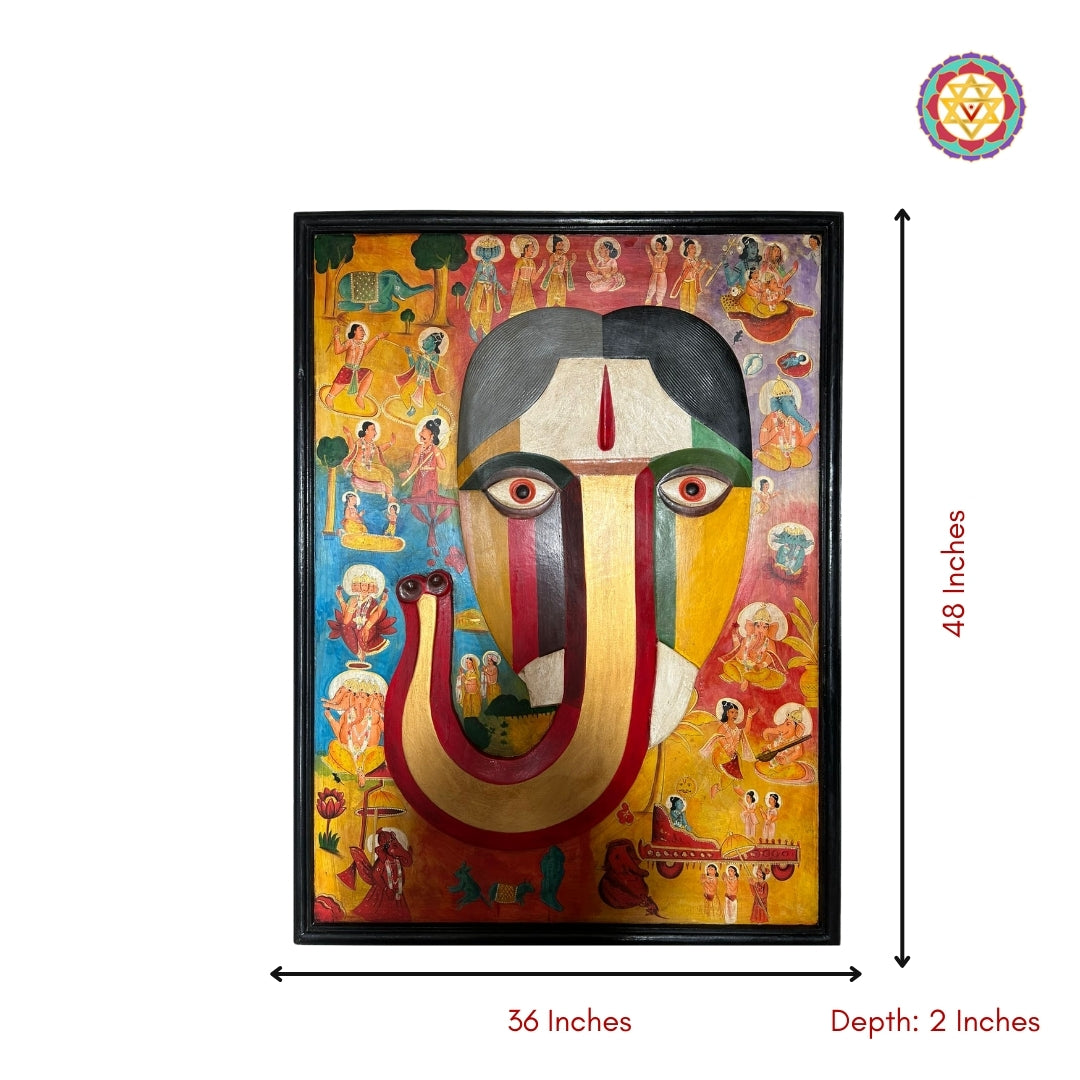 Artistic wooden Ganesha mask with vivid detailing