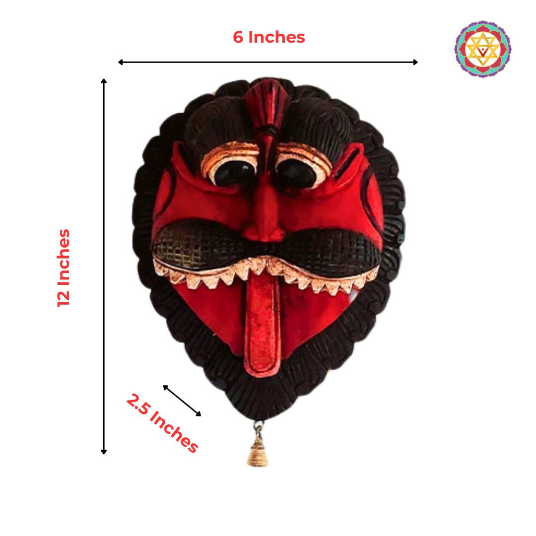 carved red wooden mask with hanging bell and hand-painted finish product image.