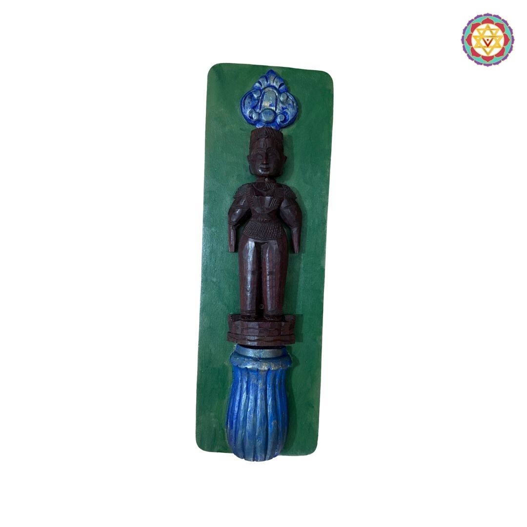 Ethnic marapachi wooden dolls displayed in handcrafted wall frame