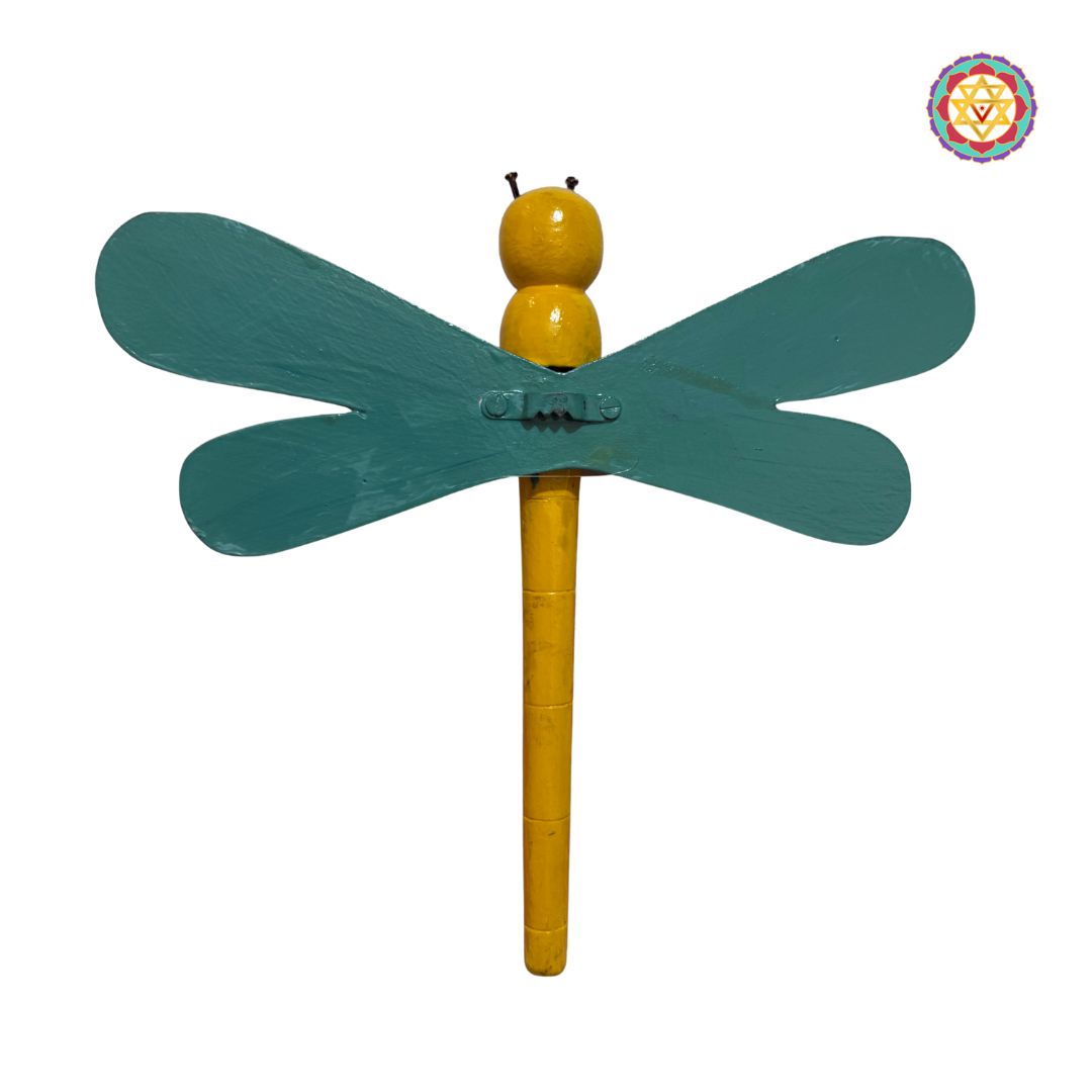 angled view showcasing layered paint and carved butterfly wings