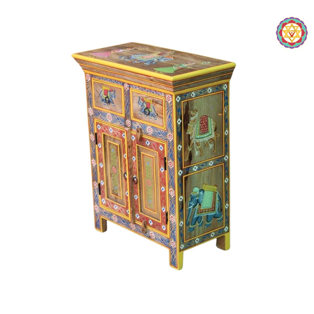 side view of cabinet featuring floral and elephant motifs