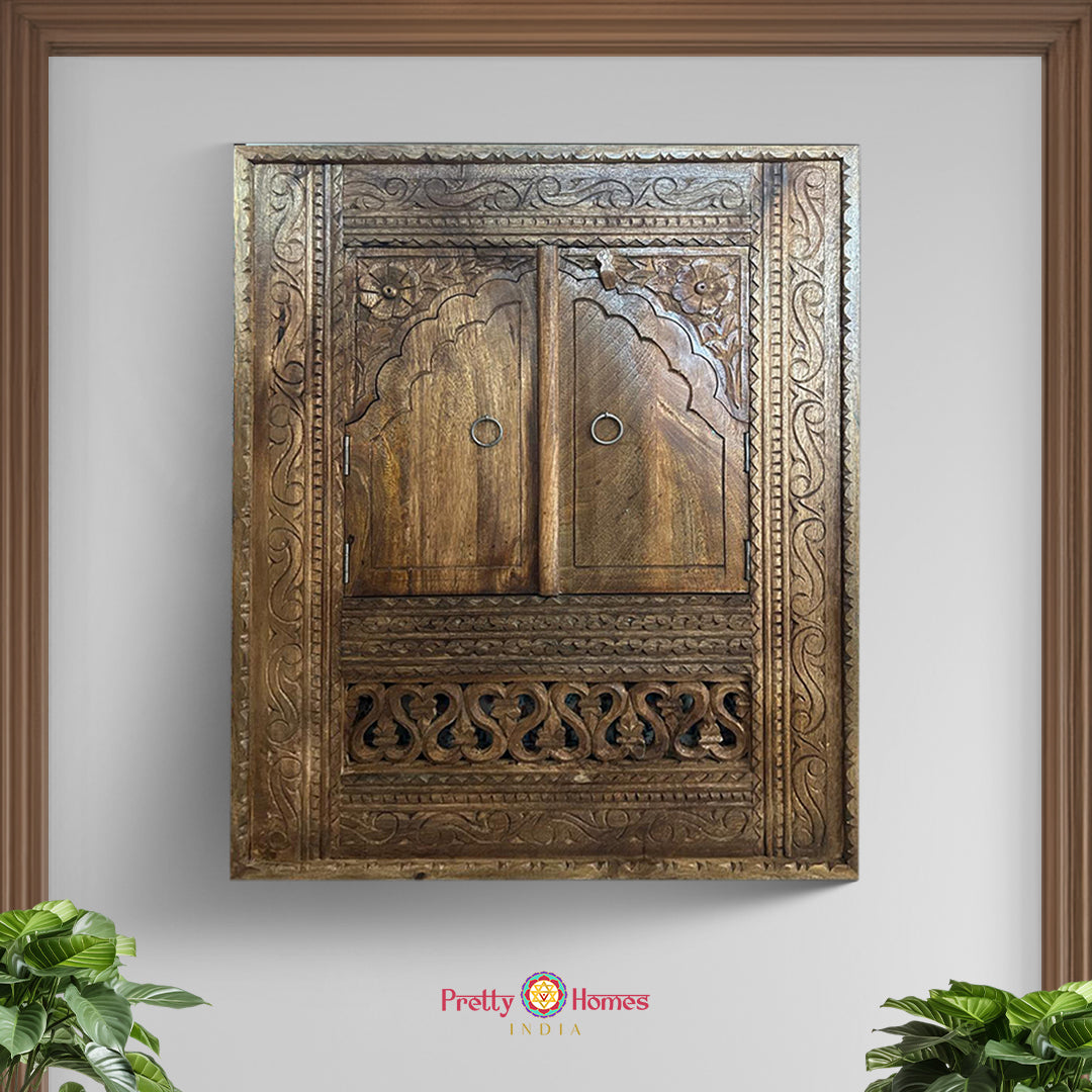 “Vintage carved wooden jharokha window frame in natural finish – Pretty Homes India.”