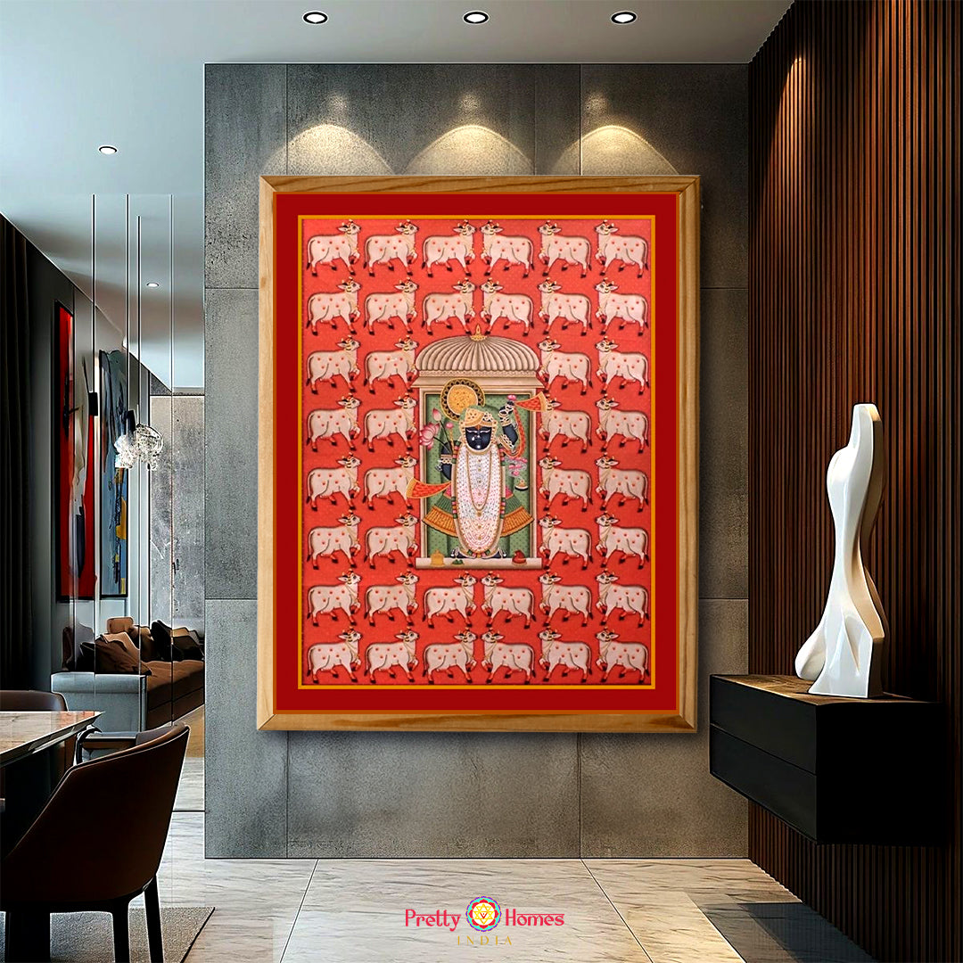 Framed Krishna Pichwai painting featuring lotus and cow elements for wall decor