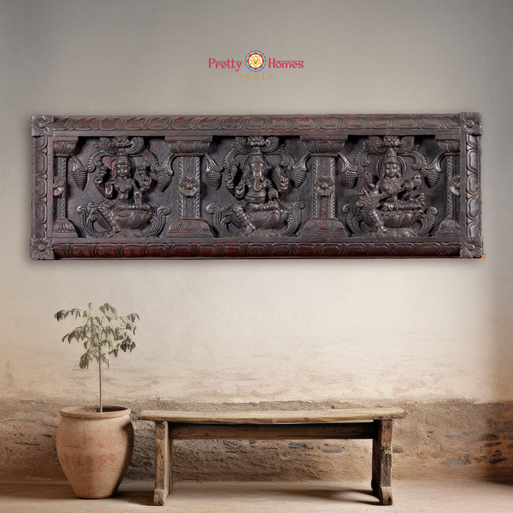 Decorative wood panels for walls with Ganesh, Lakshmi, and Saraswati
