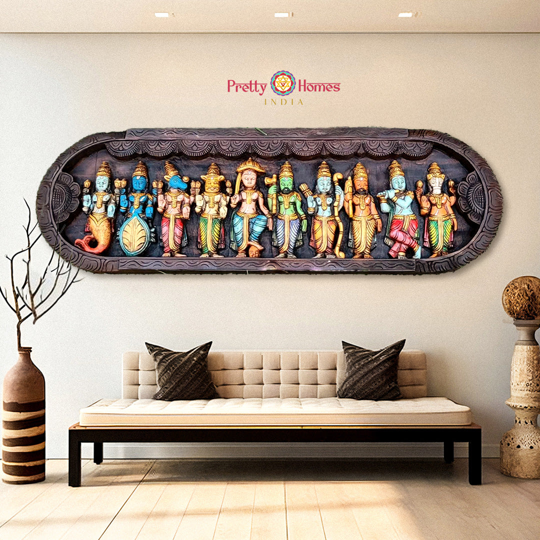 Dasavatharam wooden panel in curved shape above a living room bench

