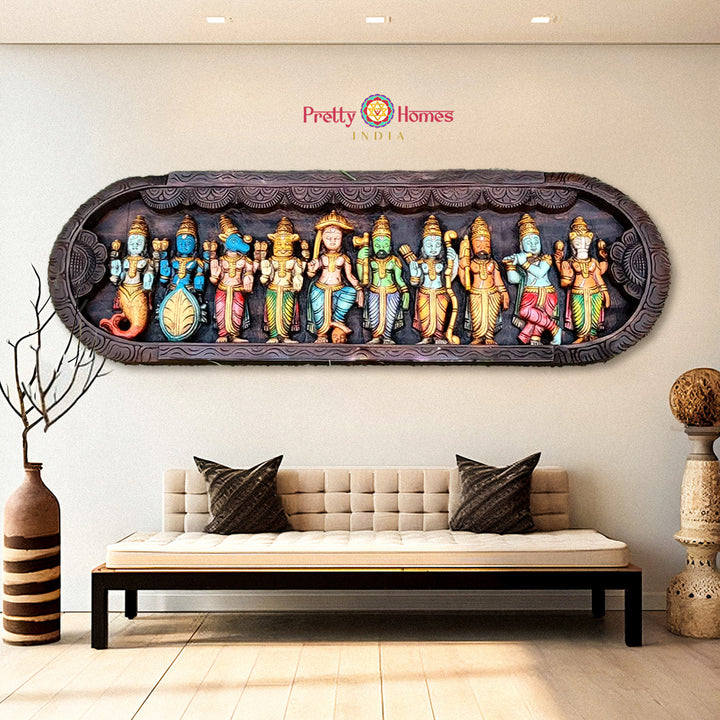 Dasavatharam wooden panel in curved shape above a living room bench

